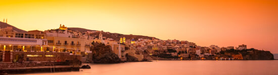 Ermoupolis at Syros island with Vaporia area and traditional houses at dusk or early in the morning before sunrise or sunset, Greece